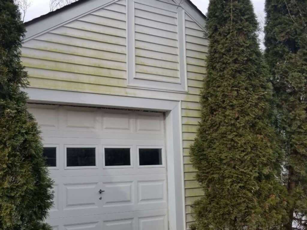 Garage Before - Vinyl Siding Pressure Washing Services